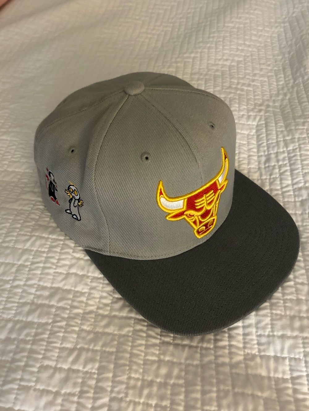 Mitchell & Ness Gray and Charcoal Chicago Bulls Snapback with Yellow Logo